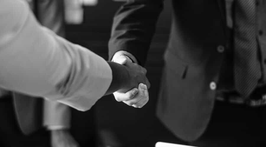black and white photo of a handshake