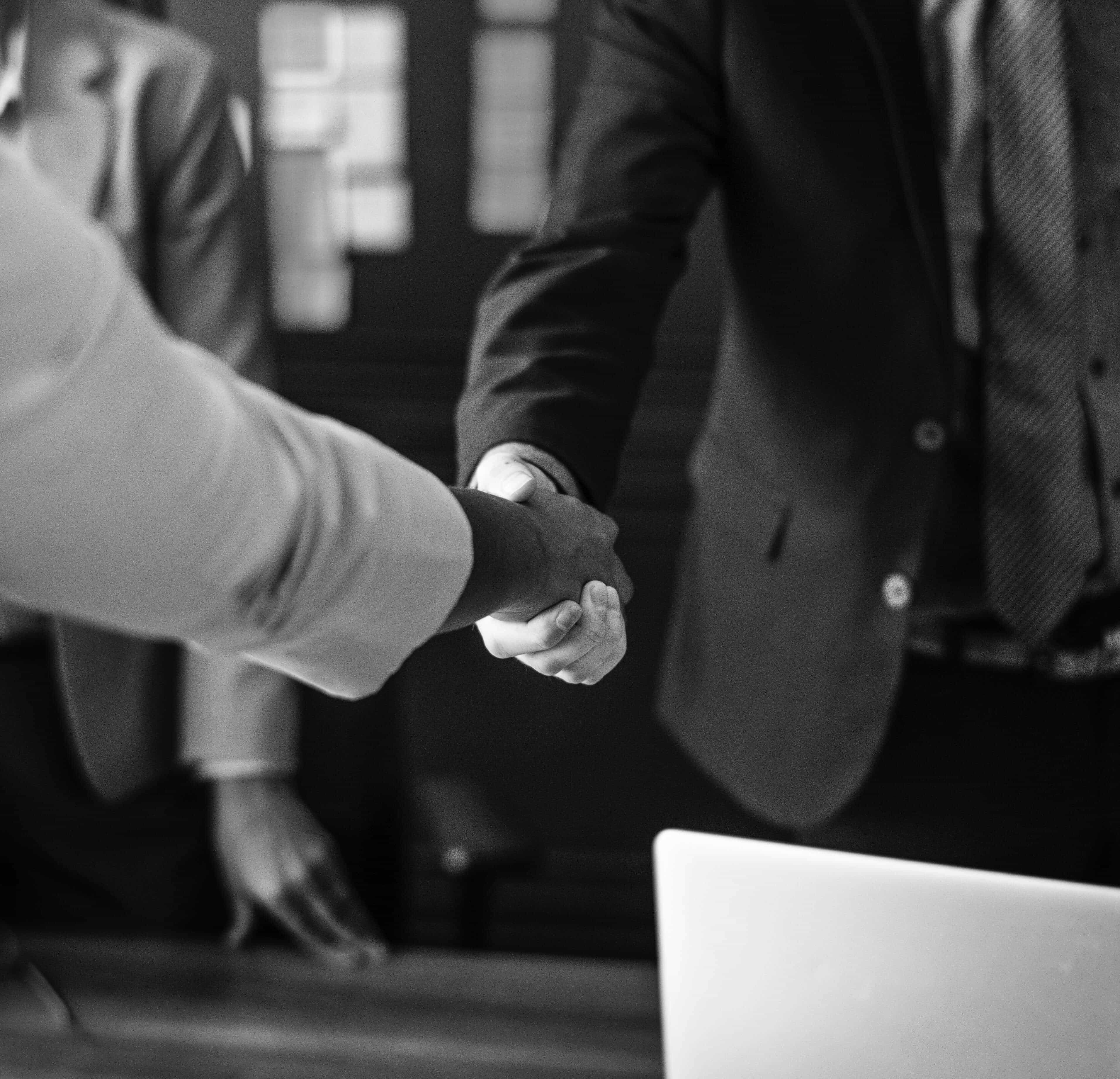 black and white photo of a handshake